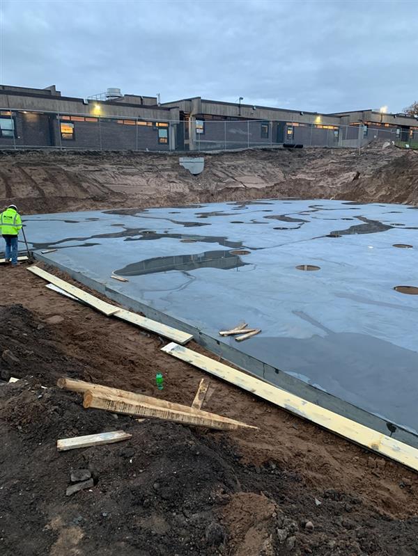 West underground storm water infiltration system poured with concrete 